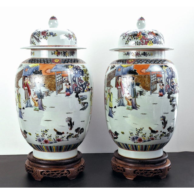 Pair of Chinese porcelain covered denglongpings, finely formed, matching, lidded, lantern shape jars with polychrome...