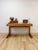 This handmade vintage desk captures the sculptural, organic modern sensibility associated with Lou Hodges-style design,...