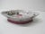 Large Chinese Export catchall oval decorative dish. Depicting flowers and crackled porcelain finish. Size: 11" L x 7.5" W...