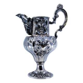 Wine Jug in Embossed Silver with Shells, Scrolls and Flowers For Sale