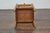 An English pine faux bamboo bedside cabinet from the 19th century with white marble top. Crafted in 19th-century England,...