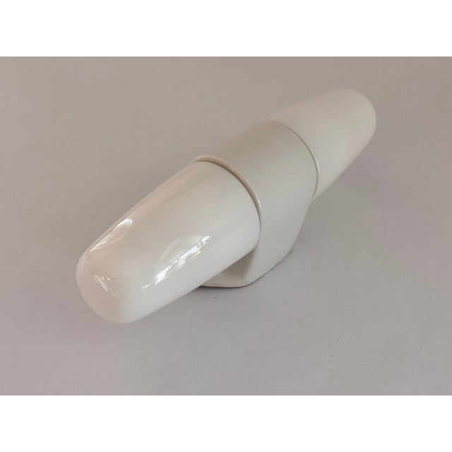 Vintage Model 6068 Sconce in Ceramic by Wilhelm Wagenfeld for Lindner, 1958, in Very Good conditions. Designed 1950 to...