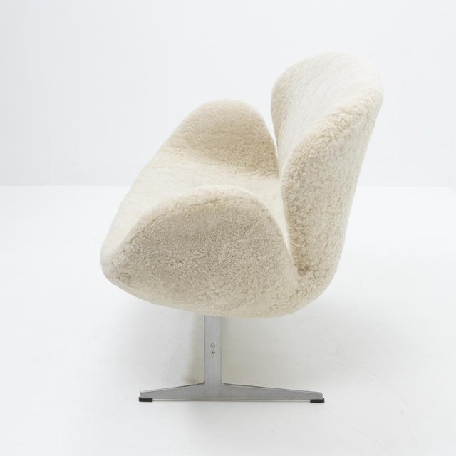 Originally designed for the SAS Royal Hotel in Copenhagen in 1958, the Swan chair and sofa were created by the Danish...