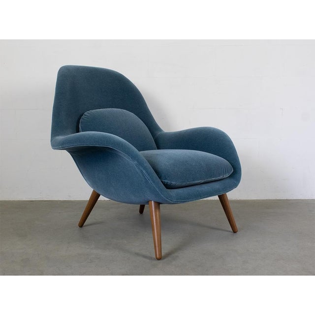 Legs walnut laquired, fabric velvet savoy 66163 Petrol. This piece has an attribution mark, I am sure that it is...