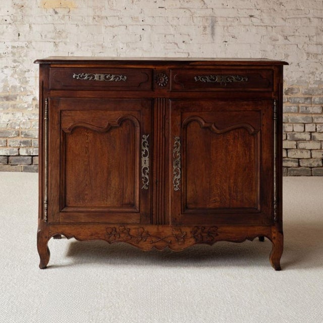 Add timeless French character to your home with this 19th century French oak buffet, a beautifully crafted piece...