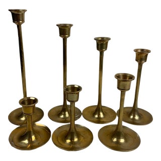 Vintage Brass Graduated Size Set of 7 Taper Tulip Candle Stick Holders For Sale