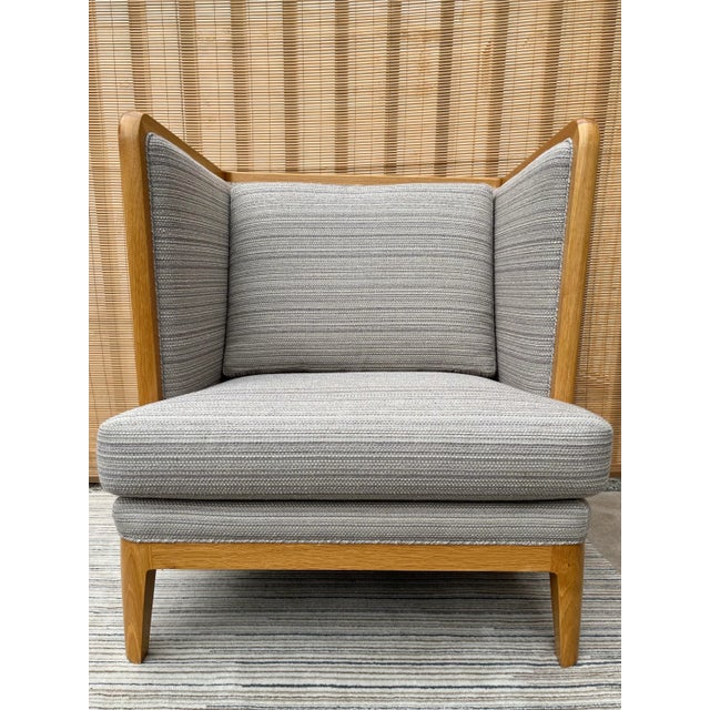 Contemporary Wingback Lounge Chair. Features a simple silhouette and a sleek modern take on the traditional Wingback chair...