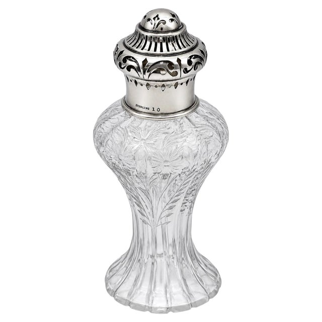 American Sterling and Engraved Glass Muffineer, Attributed to Hawkes, 1900 A finely executed American Victorian sterling-...