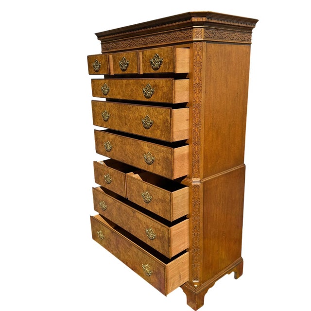 Very large chest on chest style tall boy dresser by Baker. Its 10 drawers provide ample storage space. The face of the...