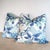 Harlequin Shenlong indoor/outdoor performance pillows in celeste/ink colorway, with coordinating navy perennials backs and...