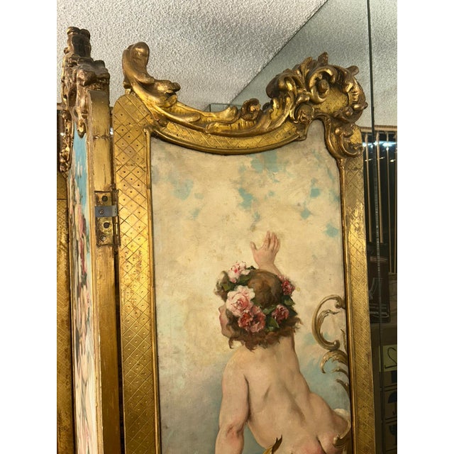 Wood Antique French Rococo Gilded Three-Panel Hand-Painted Folding Screen With Cherubs and Floral Motifs For Sale - Image 7 of 10