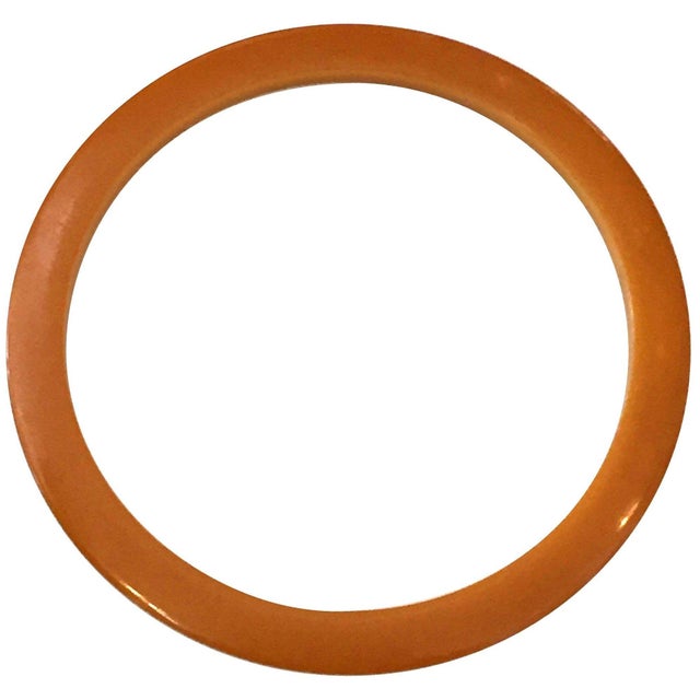 Art Deco Bakelite bracelet in a butterscotch amber color. Measures: 2 1/2" inside circumference.
