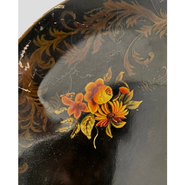 29”x 22"x 1 1/2” This expansive toleware tray serves as a striking testament to the mid-century American folk-art revival,...