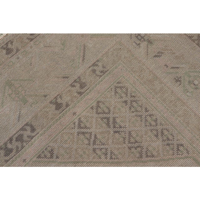 Vintage Turkish Tribal Medallion Oushak in Muted Green, Pink, and Off White For Sale - Image 16 of 16