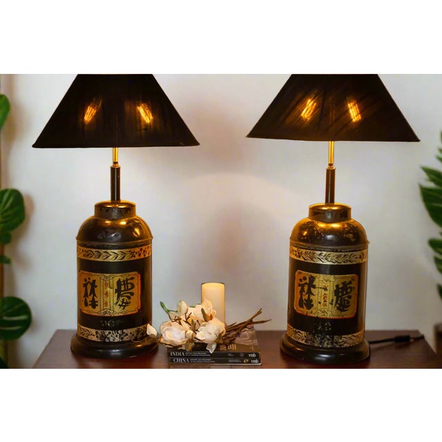 This striking pair of table lamps embodies the allure of Chinoiserie, a European decorative style inspired by the art and...