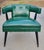 1960s tub chair with original emerald green tufted vinyl upholstery in excellent condition. Walnut frame features...