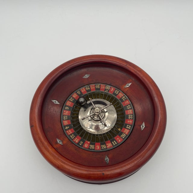 Antique Victorian Turned Mahogany Roulette Wheel with ball. Lozenge shaped canoe stops. Bring the casino home!