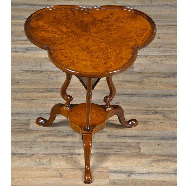 A high quality, clover top shaped Burled Clover Table produced by Niagara Furniture. Also traditionally referred to as a...