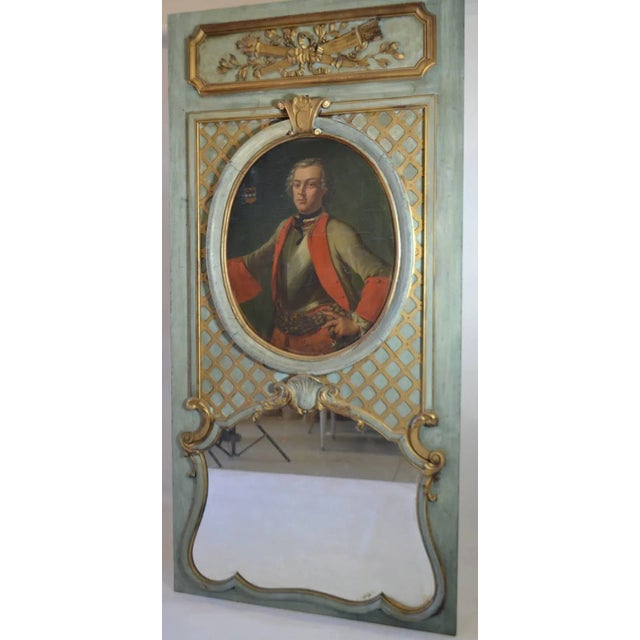 Very late 19th century carved wood trumeau with 17th century portrait.