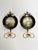 Pair of painted wood and brass wall hooks, France, 19th century. An elegant pair of turned wood and brass wall hooks,...