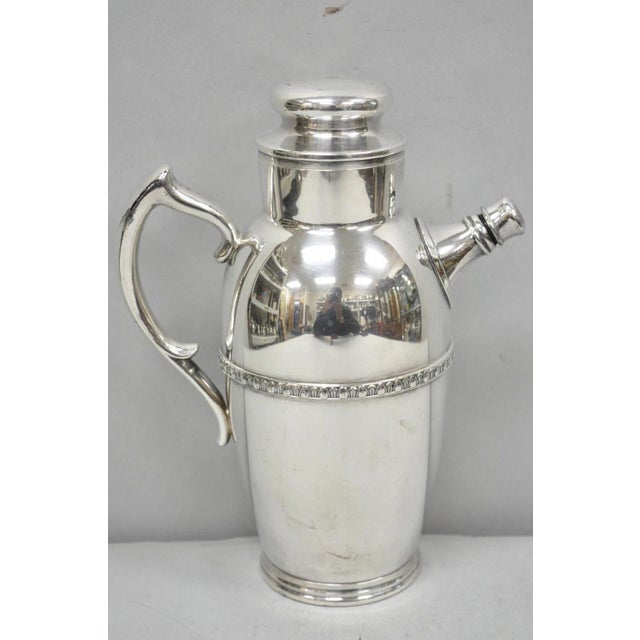 Vintage Art Deco Silver Plated Martini Cocktail Shaker Pitcher by Poole, 2601. Circa Mid 20th Century. Measurements: 10" H...