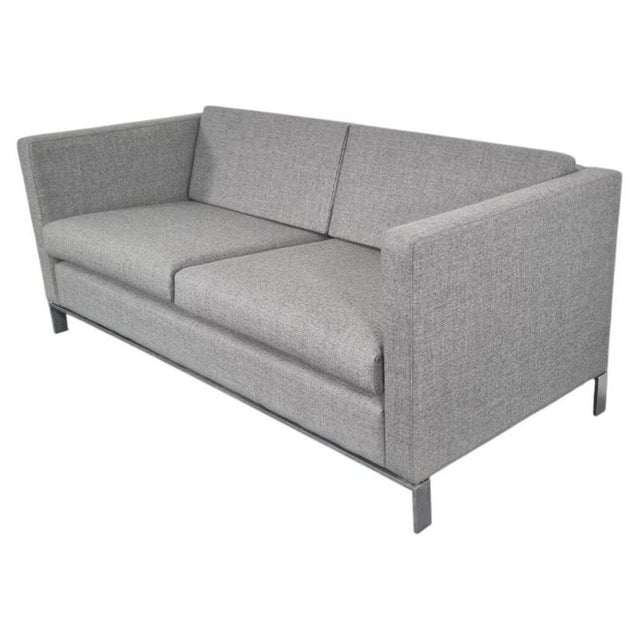 Sophisticated Walter Knoll 2.5-seater sofa, combining cosmopolitan elegance with understated contemporary design. The sofa...