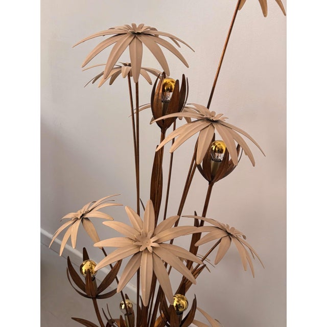 Sheet metal floor lamp with gold-patinated leaves and white enameled flowers. Ca 1990, sourced in France. Measurements: H...