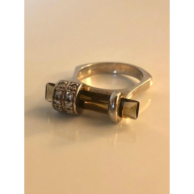 This unique and lovely Abstract Smoky Topaz Sterling Ring is beautiful with it's floating elongated smoky topaz stone...