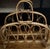 Mid-century rattan magazine rack featuring sculptural curves and honeyed tone. Effortless blend of coastal, farmhouse, and...