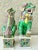 Antique Famille Verte porcelain foo dogs/guardian lions. This pair consists of a male and female lion on rectangular...