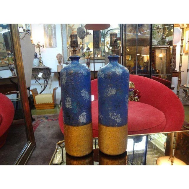 Rare stunning pair of Italian pottery lamps by Aldo Londi for Bitossi. These masterfully created unusual glazed pottery...