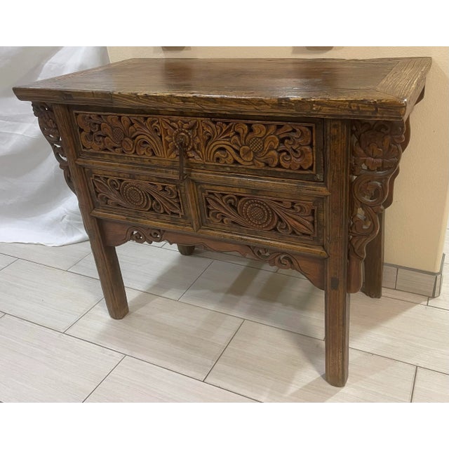 Antique Chinese carved console with a drawer, Elmwood All original details and finish never been altered. Drawer: 30”W x...