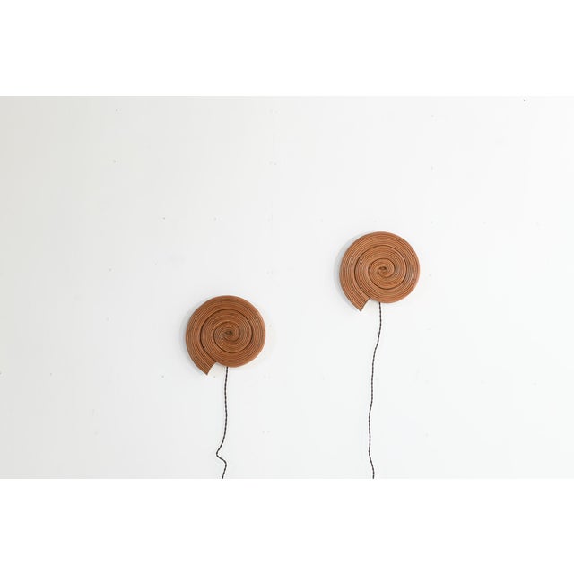 The graceful snail spiral celebrates nature's artistry while delivering contemporary sophistication. Each piece showcases...