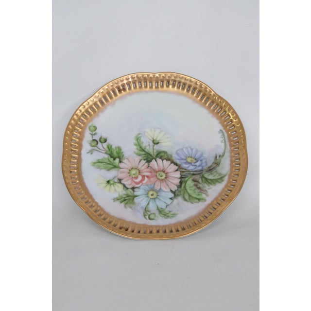 This beautiful Decorative Plate is made of porcelain. This plate has charming vintage design with a classic silhouette,...
