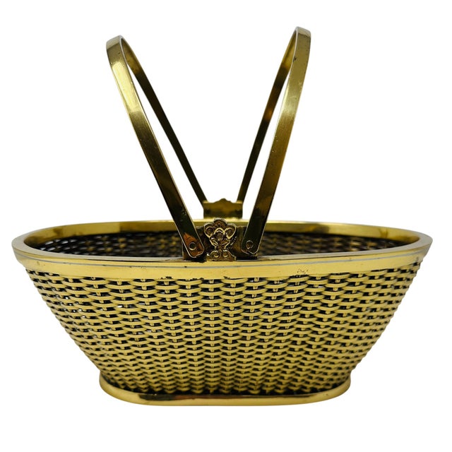 A stunning and substantial statement piece, this vintage 1970s market-style basket is a masterclass in Hollywood Regency...