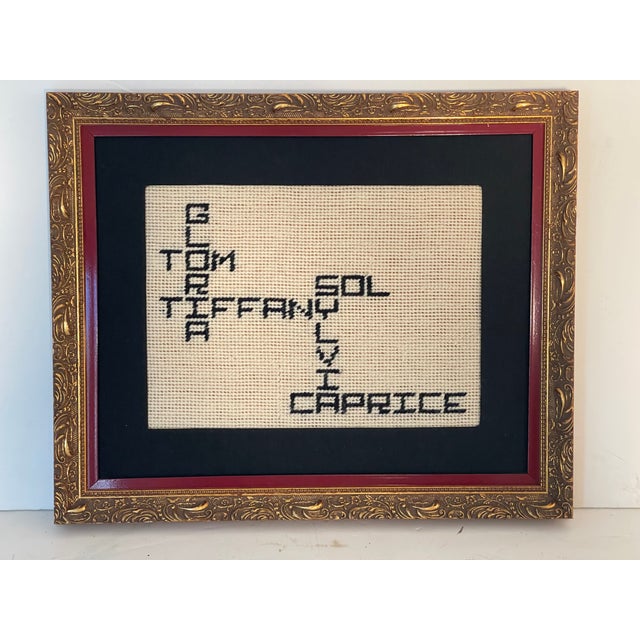 Vintage folk art Handstitched sample, in gold frame.