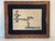 Vintage folk art Handstitched sample, in gold frame.