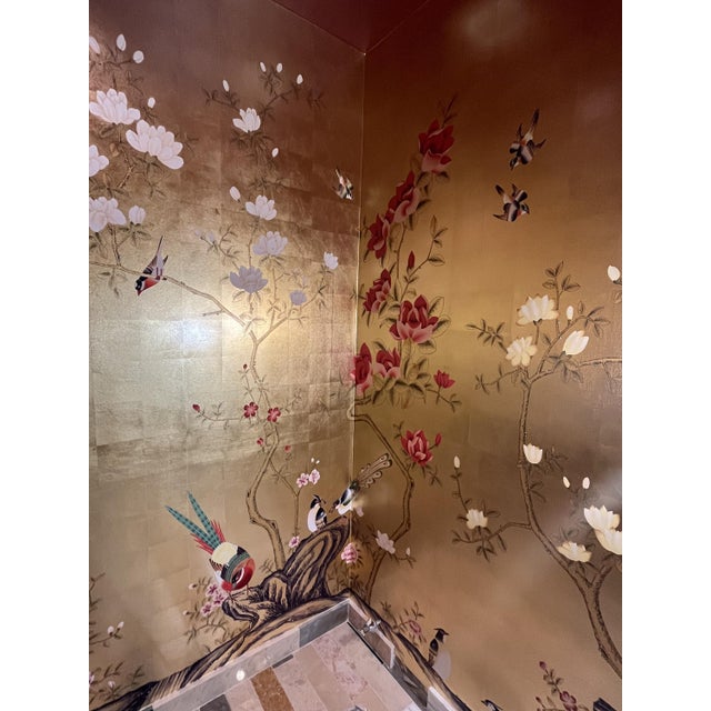 Beautiful hand-painted chinoiserie wall mural featuring songbirds, magnolia blossoms and peony flowers on shimmering gold...