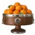 An elegant vintage pedestal center bowl crafted in richly figured quarter-sawn oak and accented with polished nickel-...