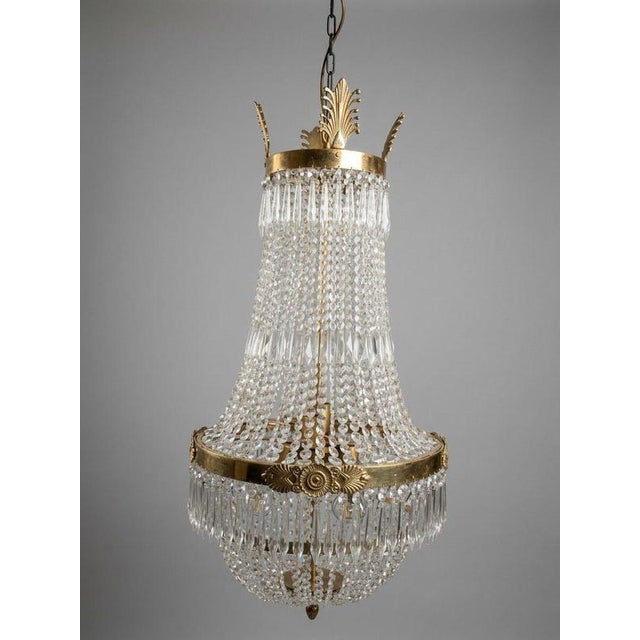 Enhance your interior with this exceptional large basket-shape chandelier, featuring a classical Sac de Perle design...