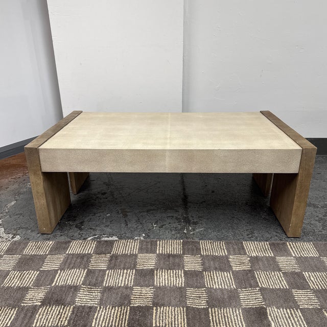 Design Plus Gallery presents a Dutton Coffee Table by Kravet. The rectangular form has a textured faux shagreen top and...