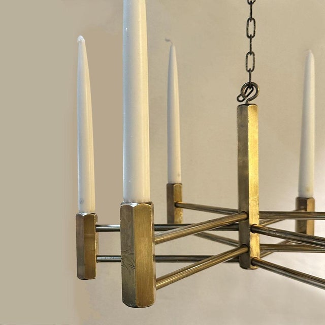 Bronze cast candelabra pendant composed of six cast arms candle holder for regular candles hanging from a chain, Germany...