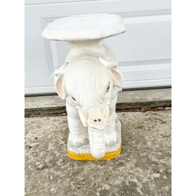 Fabulous vintage elephant garden stool. Perfect to use as a small side table or plant stand. Hand painted. I believe it’s...