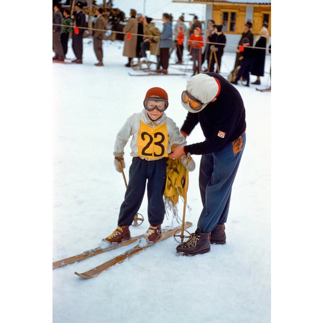 A Young Skier by Toni Frissell A young skier preparing to take part in a downhill race at the St. Anton ski resort,...