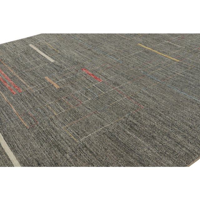 Made with handwoven wool, this 12x14 contemporary rug s a bold and exciting new addition the Modern rug collection by Rug...