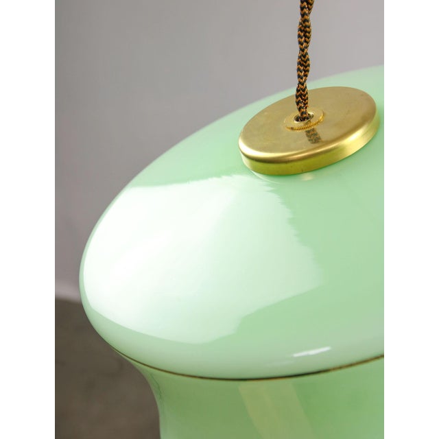 Lamp's cover is made of genuine brass material complementing this vintage item nicely with it's golden colour. total...