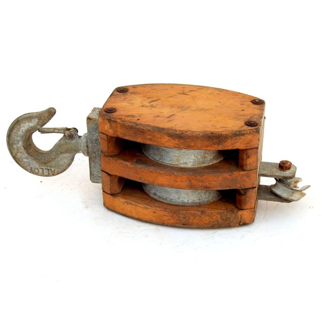 ~ This is a very nice nautical block. ~ Double rope block ~ Color is a dark stain ~ Metal pieces are green color ~ Still...