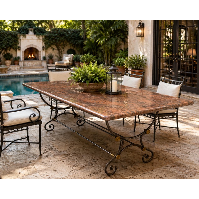 Crafted with exceptional attention to detail, this substantial vintage dining table features a beautifully polished...