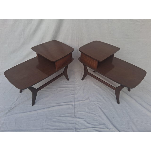 Amazing pair of 2 tiered End tables with solid wood sculpted legs, in the style of Adrian Pearsall, with laminate tops....