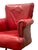 English Swivel Club Armchair Circa 1900, made of Moroccan red leather, oak wood legs and brass wheels.